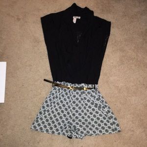 Summer romper. Black and white with lace back.